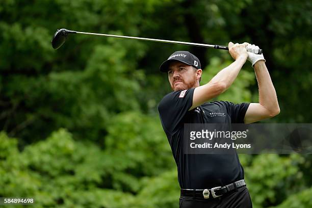 Jimmy Walker of the United States plays his shot from the third tee during the final round of the 2016 PGA Championship at Baltusrol Golf Club on...