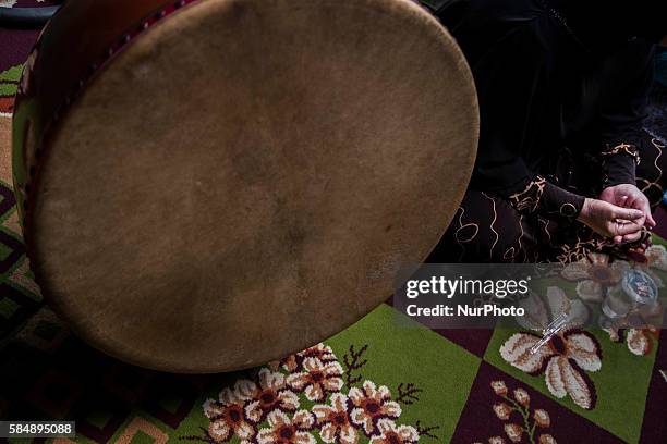 Bedug a tradition music tools made by goat skin played during the ceremonial as part of pray for the child. Aqiqah tradtion held at a moeslim...