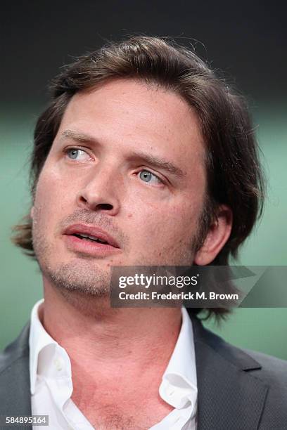 Actor Aden Young speaks onstage during the 'SundanceTV/Rectify' panel discussion at the AMC Networks portion of the 2016 Television Critics...