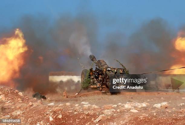 An artillery, belongs to anti-regimist opposition forces group named Jaish al-Fath, is being fired to hit an Assad Regime's base located in Rashideen...