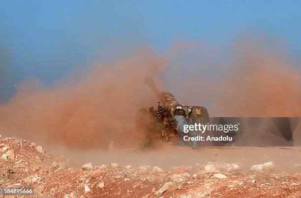 An artillery, belongs to anti-regimist opposition forces group named Jaish al-Fath, is being fired to hit an Assad Regime's base located in Rashideen...