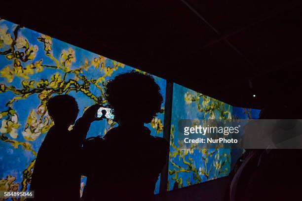 Bogota residents attended the opening of Van Gogh Alive, in Bogota, on July 30, 2016. An innovative experience that explores the senses of viewers...