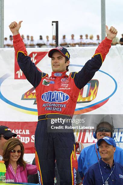 Jeff Gordon celebrates winning the NASCAR Winston Cup Series Kmart 400 at Michigan International Speedway in Brooklyn, Michigan. DIGITAL IMAGE....