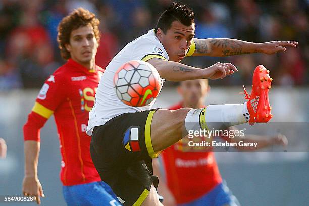 Esteban Paredes jumps for the ball during a match between Colo Colo and Union Espanola as part of Campeonato Apertura 2016 at Monumental David...