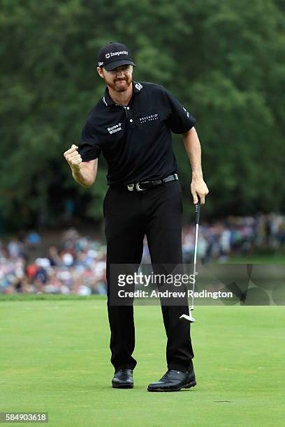 Jimmy Walker of the United States celebrates his putt for par on the 18th hole to win the 2016 PGA Championship at Baltusrol Golf Club on July 31,...