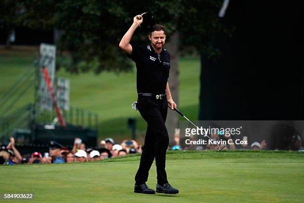Jimmy Walker of the United States celebrates his putt for par on the 18th hole to win the 2016 PGA Championship at Baltusrol Golf Club on July 31,...
