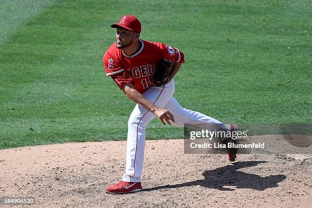 Huston Street of the Los Angeles Angels of Anaheim pitches in the ninth inning against the Boston Red Sox at Angel Stadium of Anaheim on July 31,...