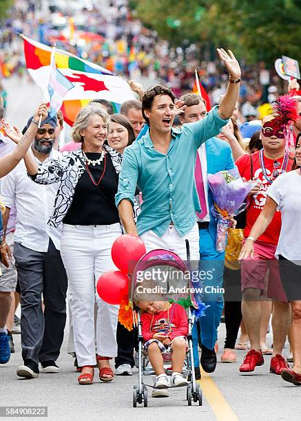 Prime Minister of Canada Justin Trudeau pushes his youngest son Hadrien Trudeau in a stroller during the 38th Annual Vancouver Pride Parade on July...