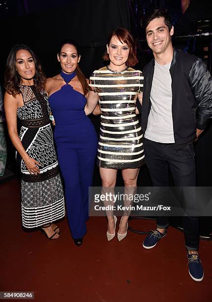 Divas Brie Bella and Nikki Bella and actors Daisy Ridley and Matthew Daddario attend the Teen Choice Awards 2016 at The Forum on July 31, 2016 in...