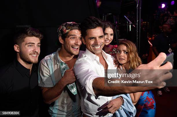 Actors Cody Christian, Tyler Posey, John Stamos, Shelley Hennig and Sarah Hyland attend the Teen Choice Awards 2016 at The Forum on July 31, 2016 in...