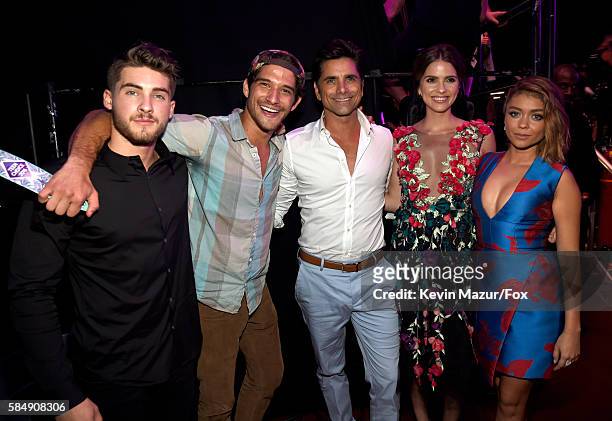 Actors Cody Christian, Tyler Posey, John Stamos, Shelley Hennig and Sarah Hyland attend the Teen Choice Awards 2016 at The Forum on July 31, 2016 in...