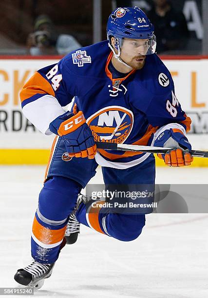 Mikhail Grabovski of the New York Islanders plays in the game against the Calgary Flames at Barclays Center on October 26, 2015 in Brooklyn borough...