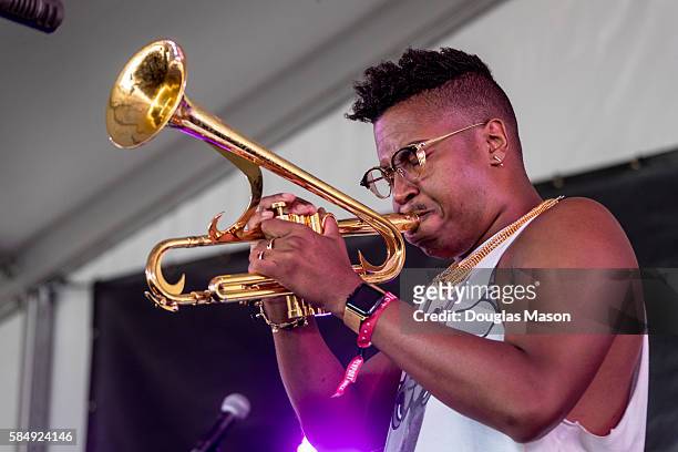Christian Scott performs during the Newport Jazz Festival 2016 at Fort Adams State Park on July 31, 2016 in Newport, Rhode Island.