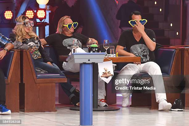 Carmen Geiss, Robert Geiss and Gregor Glanz as Team Die Geissens during the tv show 'Der grosse RTL II-Promi-Kegelabend' on July 31, 2016 in...