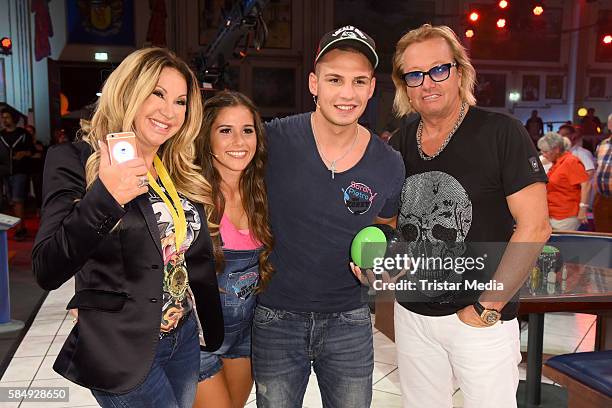 Carmen Geiss, Sarah Lombardi, Pietro Lombardi and Robert Geiss during the tv show 'Der grosse RTL II-Promi-Kegelabend' on July 31, 2016 in...