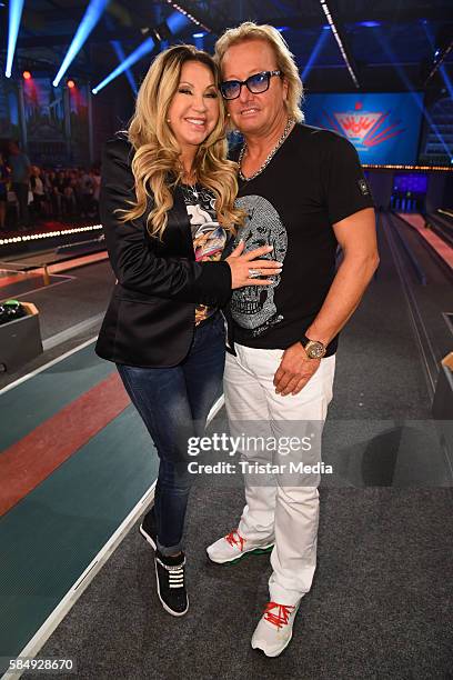 Carmen Geiss and her husband Robert Geiss during the tv show 'Der grosse RTL II-Promi-Kegelabend' on July 31, 2016 in Winterberg, Germany.