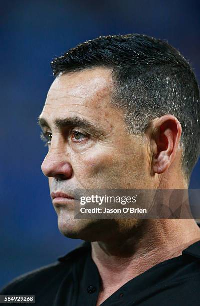 Sharks coach Shane Flanagan looks on during the round 21 NRL match between the Gold Coast Titans and the Cronulla Sharks at Cbus Super Stadium on...