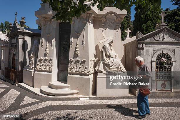 Individual tombs and family mausoleums, on 14th July 2016, at Prazeres Cemetery, Lisbon, Portugal. Prazeres Cemetery is the largest cemetery in...