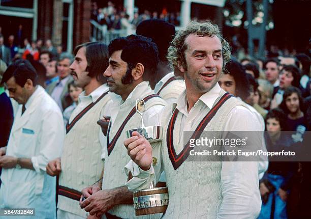 Lancashire captain David Lloyd holds the Gillette Cup after Lancashire won the Gillette Cup Final between Lancashire and Middlesex at Lord's Cricket...