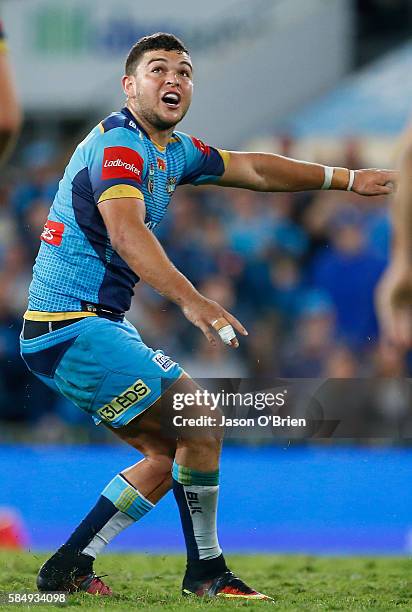 Ashley Taylor of the Titans looks on after attempting a field goal during the round 21 NRL match between the Gold Coast Titans and the Cronulla...