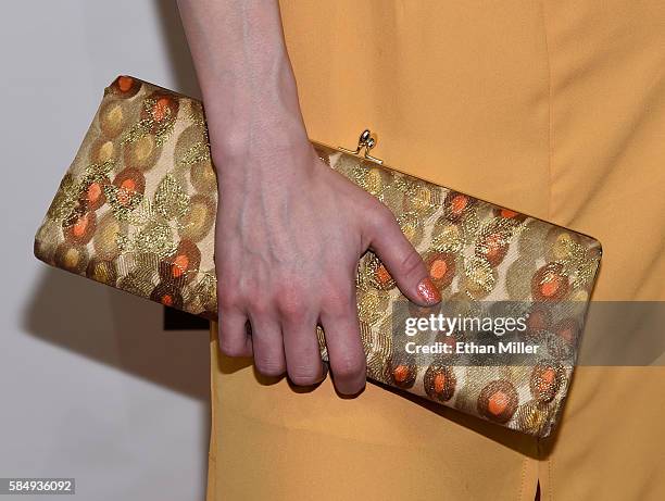 Model Claire Sinclair, purse detail, attends the premiere of Syfy's "Sharknado: The 4th Awakens" at the Stratosphere Casino Hotel on July 31, 2016 in...