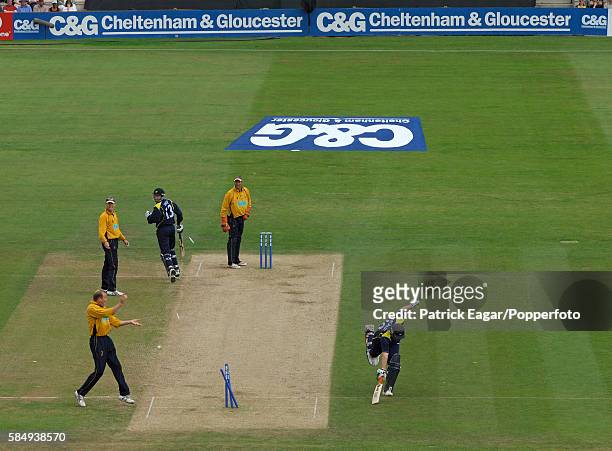 Anthony McGrath of Yorkshire is run out by a direct hit from Shane Watson of Hampshire during the Cheltenham & Gloucester Trophy Semi Final between...