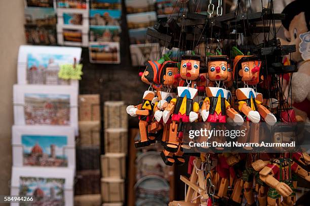 pinocchio souvenir at florence market - pinocchio stock pictures, royalty-free photos & images