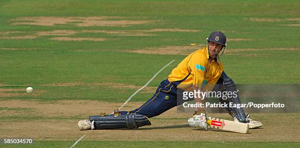Nic Pothas of Hampshire reverse sweeps for 4 runs during his 68 in the Cheltenham & Gloucester Trophy Final between Hampshire and Warwickshire at...