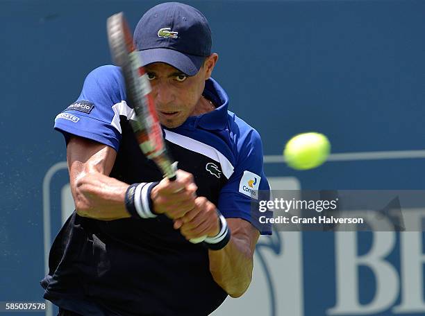 Thiago Montiero of Brazil plays returns a shot to Tim Smyczek of the United States during the BB&T Atlanta Open at Atlantic Station on August 1, 2016...