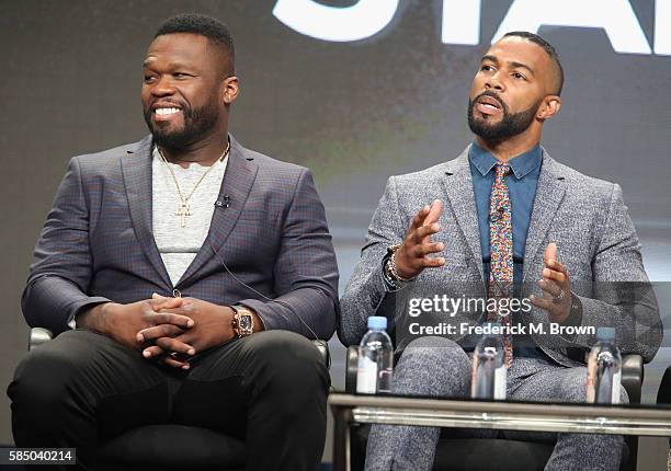 Executive producer/actor Kurtis "50 Cent" Jackson and actor Omari Hardwick speak onstage during the 'Power' panel discussion at the Starz portion of...