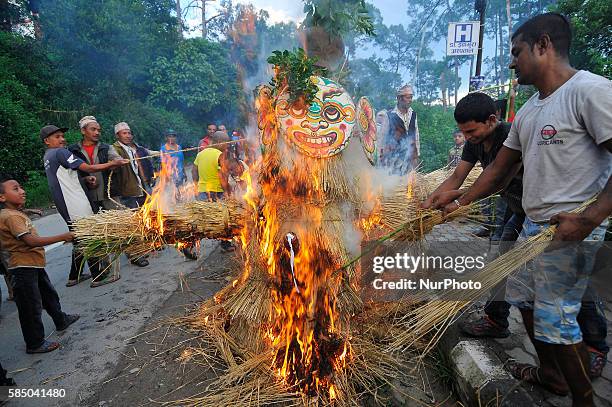 Nepalese devotees celebrate Gathemangal festival by burning effigy of demon Ghanta Karna during the Ghanta Karna 'Gathemangal' festival celebrated in...