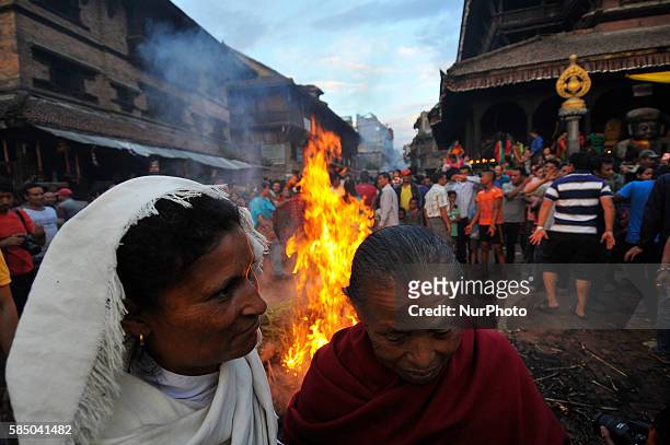 Nepalese devotees celebrate Gathemangal festival by burning effigy of demon Ghanta Karna during the Ghanta Karna 'Gathemangal' festival celebrated in...