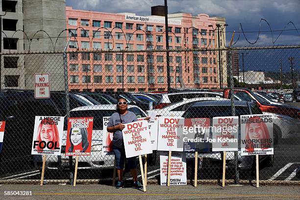 Former American Apparel employee Alicia Castrueita protesting outside the American Apparel factory and headquarters in downtown Los Angeles. On...