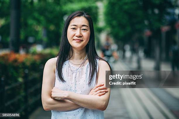 femininity and confidence - east asian people stock pictures, royalty-free photos & images