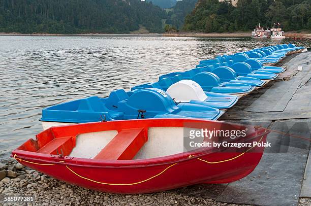 red boat - pedal boat stock pictures, royalty-free photos & images
