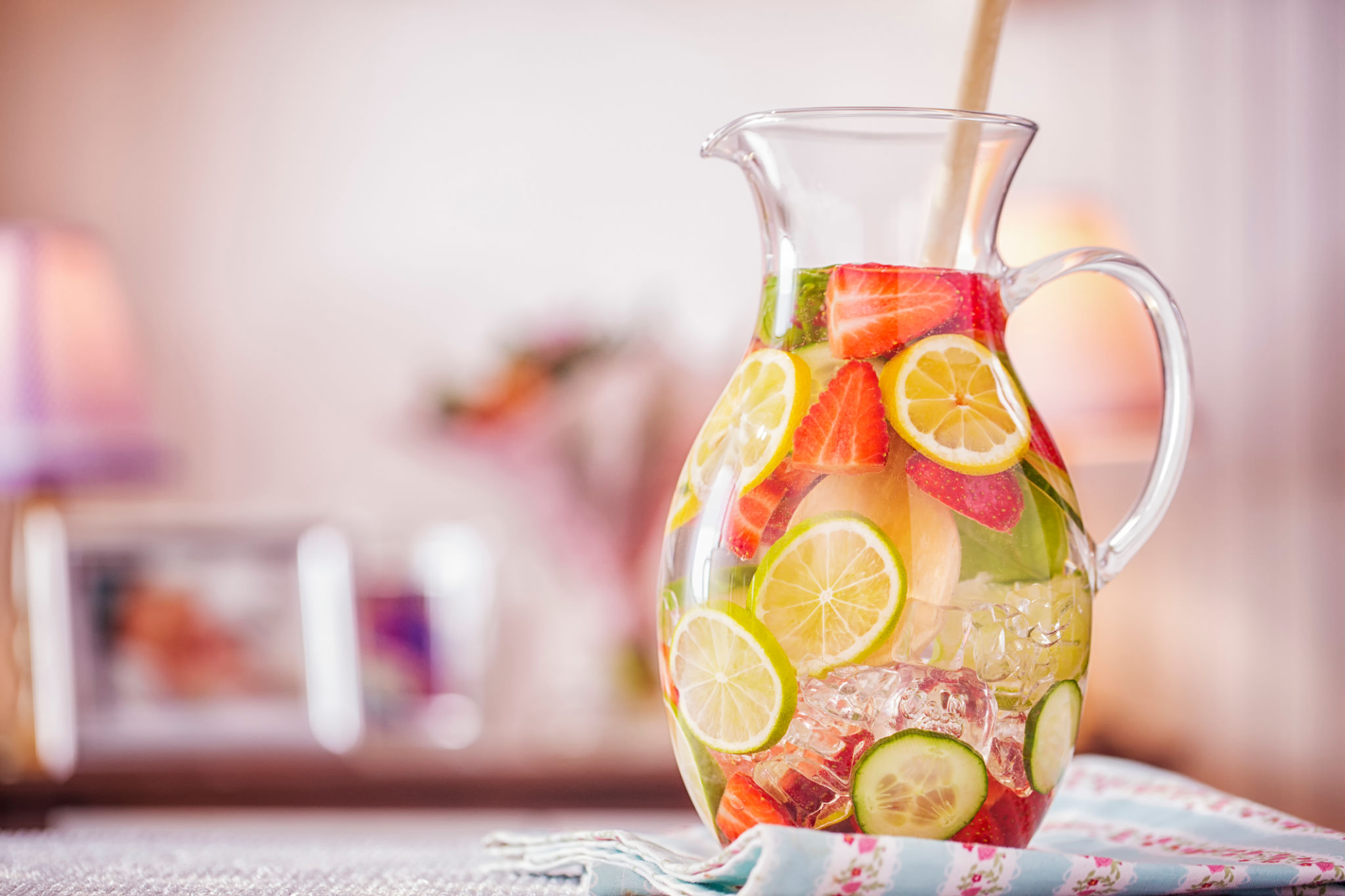 Infused Water with Fresh Strawberries, Lime, Lemon and Basil Infused Water with Fresh Strawberries, Lime, Lemon and Basil
