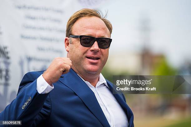 Conspiracy theorist and radio talk show host Alex Jones speaks during a rally in support of Donald Trump near the Republican National Convention...