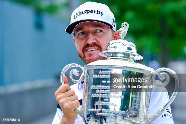 Championship winner Jimmy Walker looks on during a media tour on August 1, 2016 in New York City.