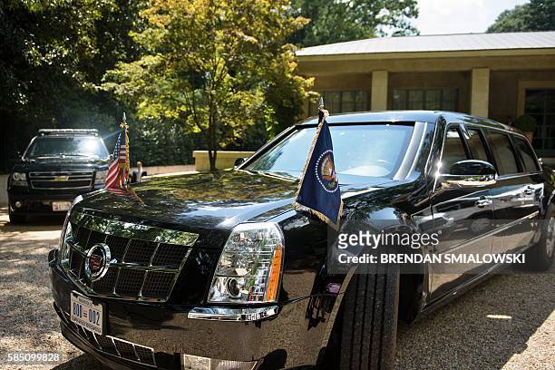 One of US President Barack Obama's armored limos is seen outside a home where he was fundraising for Democratic US Presidential candidate Hillary...