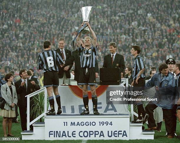 Dennis Bergkamp of Inter Milan holding the trophy following the UEFA Cup Final 2nd leg between Inter Millan and Salzburg at the Stadio Giuseppe...