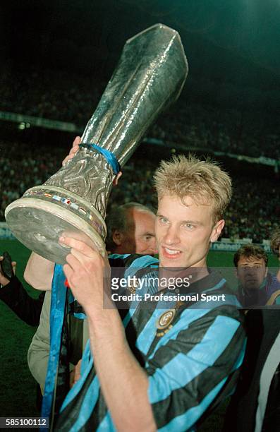 Dennis Bergkamp of Inter Milan holding the trophy following the UEFA Cup Final 2nd leg between Inter Millan and Salzburg at the Stadio Giuseppe...