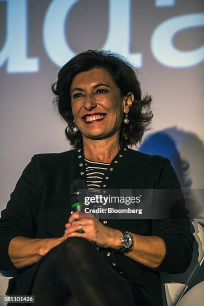 Maria Silvia Bastos, chief executive officer of Banco Nacional de Desenvolvimento Economico e Social , smiles during the 25th anniversary ceremony of...