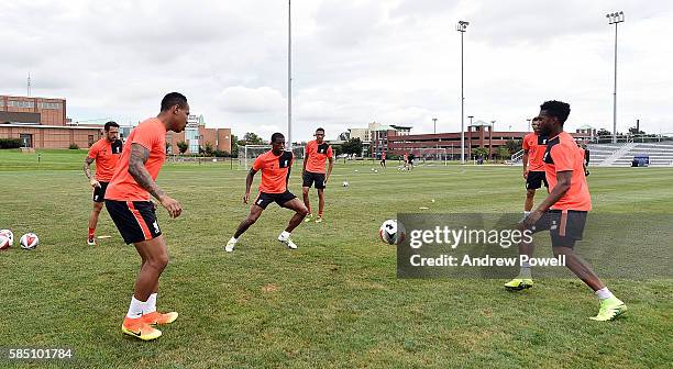 Nathaniel Clyne, Daniel Sturridge and Georginio Wijnaldum of Liverpool during a training session at St Louis University on August 1, 2016 in St...