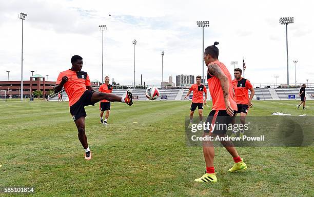 Sheyi Ojo and Roberto Firmino of Liverpool during a training session at St Louis University on August 1, 2016 in St Louis, Missouri.