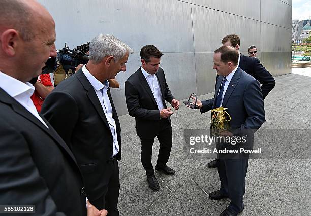 Mayor of St Louis Francis G. Slay talks with Billy Hogan Chief Commercial Officer of Liverpool and ambassadors of Liverpool Gary Mcallister, Ian Rush...