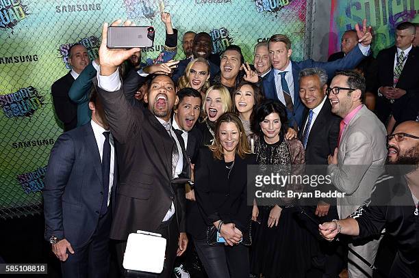 The cast and crew of Suicide Squade take a selfie during the Suicide Squad premiere sponsored by Carrera at Beacon Theatre on August 1, 2016 in New...