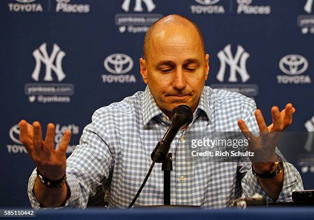 Brian Cashman, general manager of the New York Yankees, talks during a press conference before a game against the New York Mets at Citi Field on...