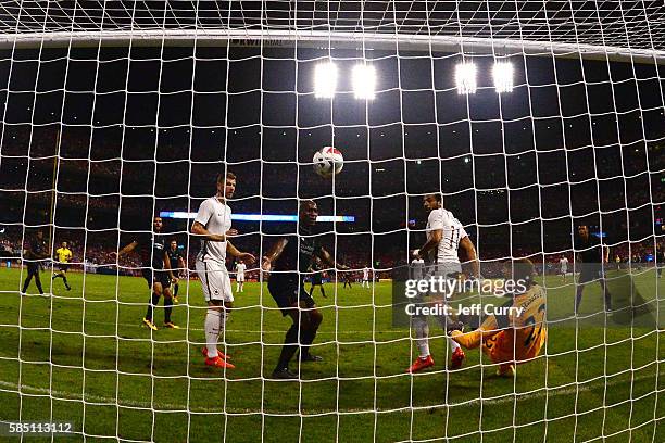 Simon Mignolet of Liverpool FC gives up the game winning goal to Mohamed Salah of AS Roma during a friendly match at Busch Stadium on August 1, 2016...