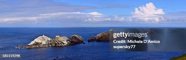 the lonely rocks of muckle flugga. - rookery building stock pictures, royalty-free photos & images