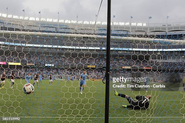 July 30: Frank Lampard of New York City FC completes his hat trick as he beats Goalkeeper Tim Howard of Colorado Rapids from the penalty spot during...